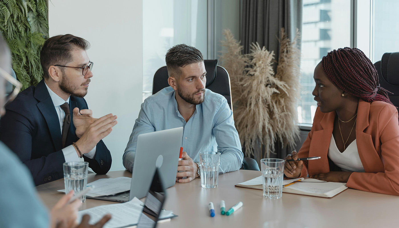 A team having a meeting about financial projections.