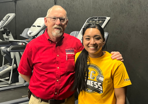 A man and a woman posing for a photo together.