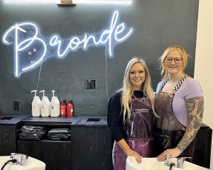 Two women in a hair salon.